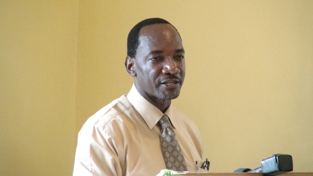 Assistant Secretary in the Premier’s Ministry Kevin Barrett delivering remarks at the Department of Education’s Prospective Teachers Course 2015, on June 22 at the department’s conference room at Pinney’s